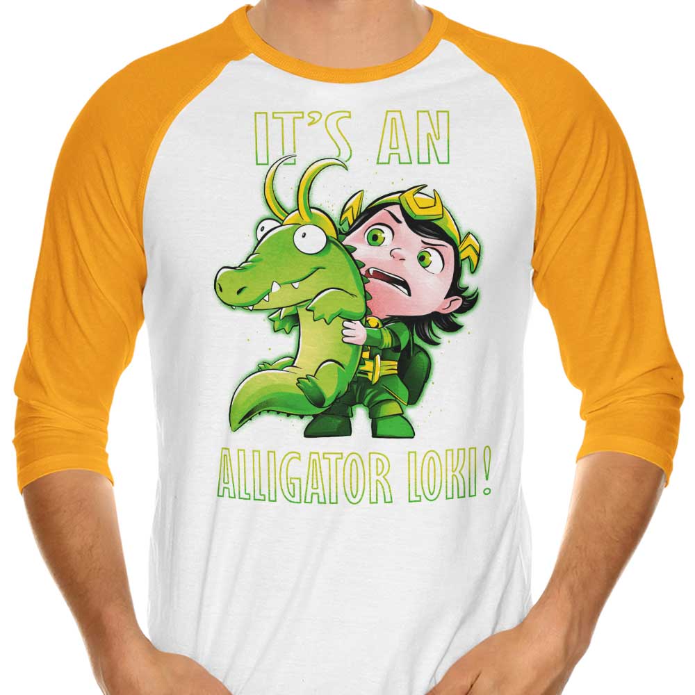 A Stylish 3/4 Sleeve Raglan T-Shirt Featuring 'It's an Alligator' Design
